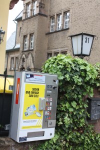 Street-side cigarette vending machine