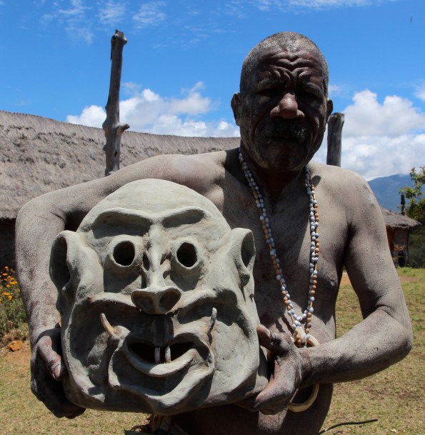 Mudman with his mask