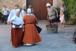 Medieval dance display with grape&nbsp;stomper