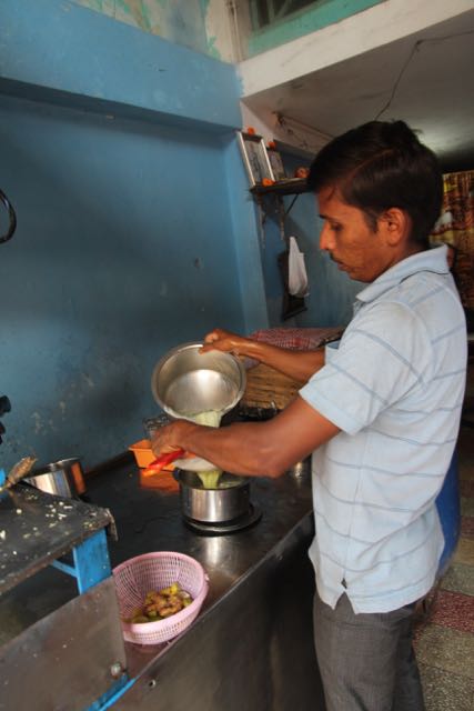 Straining sugar cane juice