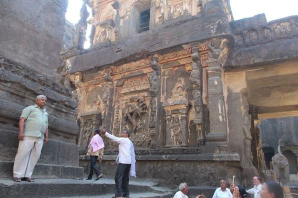 Sculptures and tourists, Ellora Caves