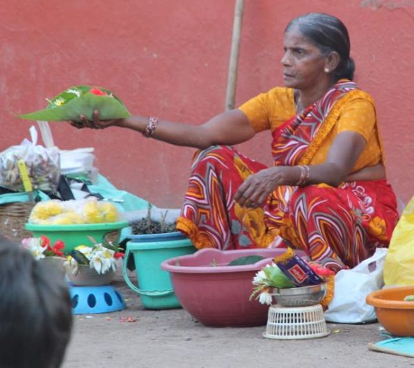 Selling temple offerings, India