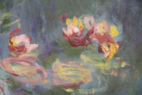 Monet close-up water lily red yellow