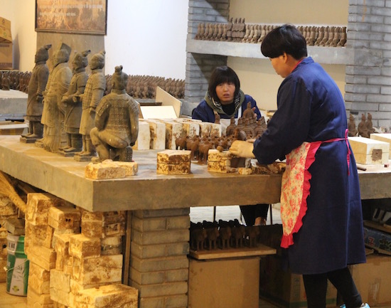Making pottery, China
