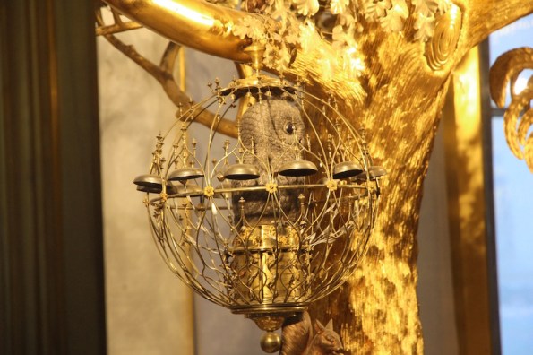 The caged owl on the Peacock Clock