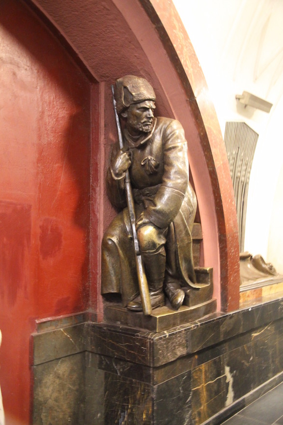 Sculpture at Ploschad Revolyutsii station, Moscow