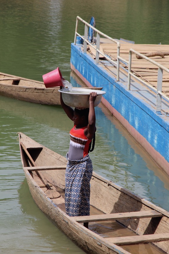 Gathering water for laundry, Ivory Coast