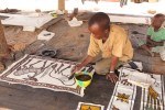 Painting Korhogo cloth