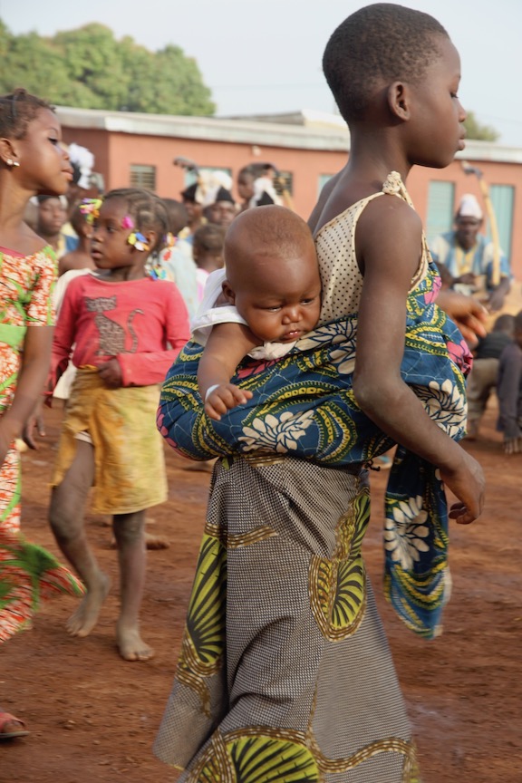 Carrying a baby, Ivory Coast