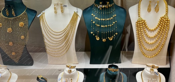 gold draping necklaces