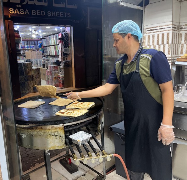 Griddling a bread and egg dish