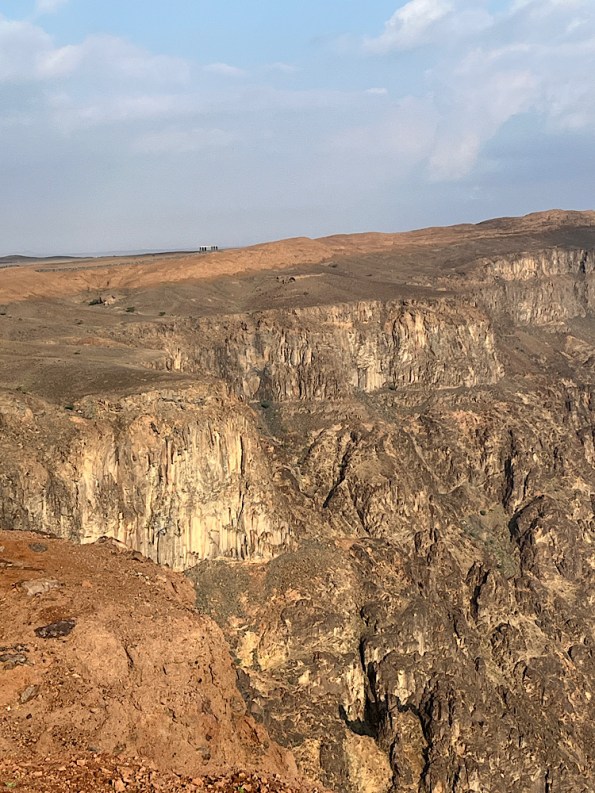 Steep walls of Wahba crater